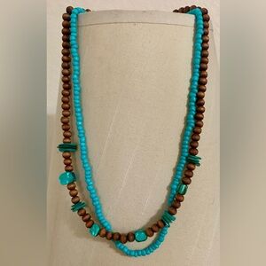 Pretty necklace 2 in 1
Brown wood beads with turquoise.
